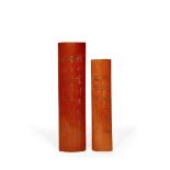 TWO CHINESE BAMBOO WRIST RESTS, 19TH CENTURY Each inscribed with scholastic poems, 31.5cm max. (2)