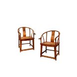 A PAIR OF CHINESE HUANGHUALI HORSESHOE-BACKED ARMCHAIRS, QUANYI, QING DYNASTY Each with a curved