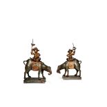 A PAIR OF CHINESE PEWTER PRICKET CANDLESTICKS, C.1800 Modelled as caparisoned elephants, each with