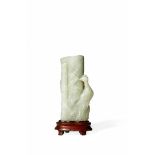 A CHINESE PALE CELADON JADE VASE, LATE QING DYNASTY The elongated body carved as a section of