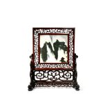 A CHINESE DREAMSTONE TABLE SCREEN, QING DYNASTY The square panel with dark grey striations,