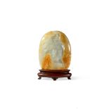 A CHINESE PALE CELADON JADE BOULDER CARVING, QING DYNASTY Carved in shallow relief as a mountain,