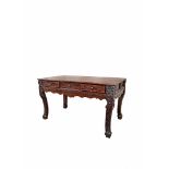 A LARGE CHINESE HARDWOOD TABLE, LATE QING DYNASTY With three frieze drawers carved with mythical