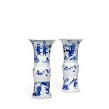 A PAIR OF CHINESE BLUE AND WHITE GU BEAKER VASES, KANGXI 1662-1722 Each painted with very similar