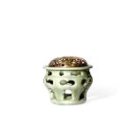 A CHINESE LONGQUAN CELADON RETICULATED STAND, 15TH CENTURY Of baluster form on a ring foot, with