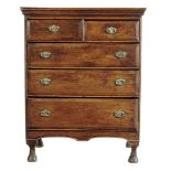 An early 18th century oak chest, of two short and three long drawers with chamfered edge fronts,