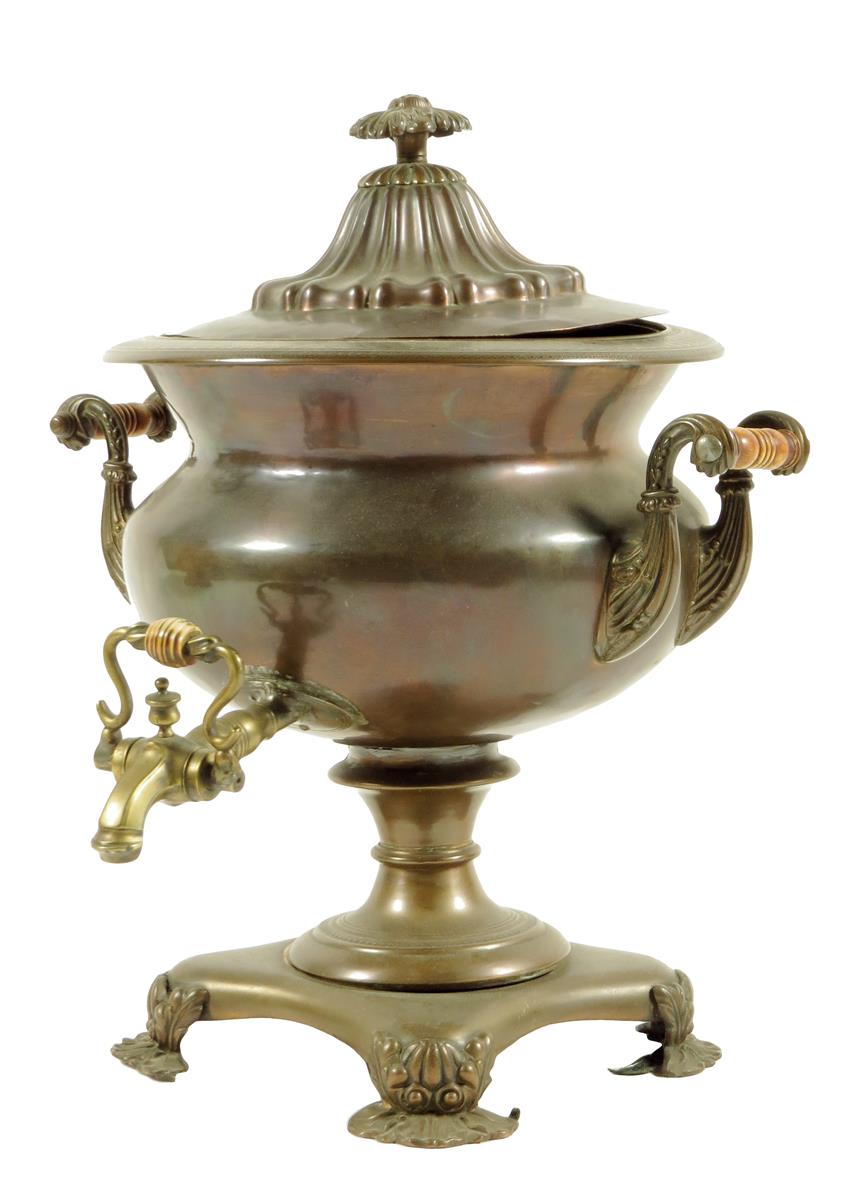 λ An early 19th century bronze and copper samovar, with a brass spout, with scroll handles with