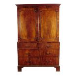 An early George III mahogany linen press, with a detachable cornice above a pair of doors with