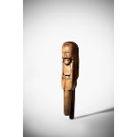 A rare treen lever action nutcracker, carved with the head of a man, with a flat face and engraved