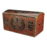 An early 19th century Scandinavian painted pine marriage chest, the domed lid painted with panels of