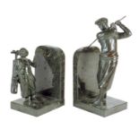 Golfing interest. A pair of serpentine and patinated metal bookends, modelled with a golfer mid