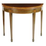 A mahogany and harewood demi-lune tea table, banded in satinwood, the fold-over top on twin gate