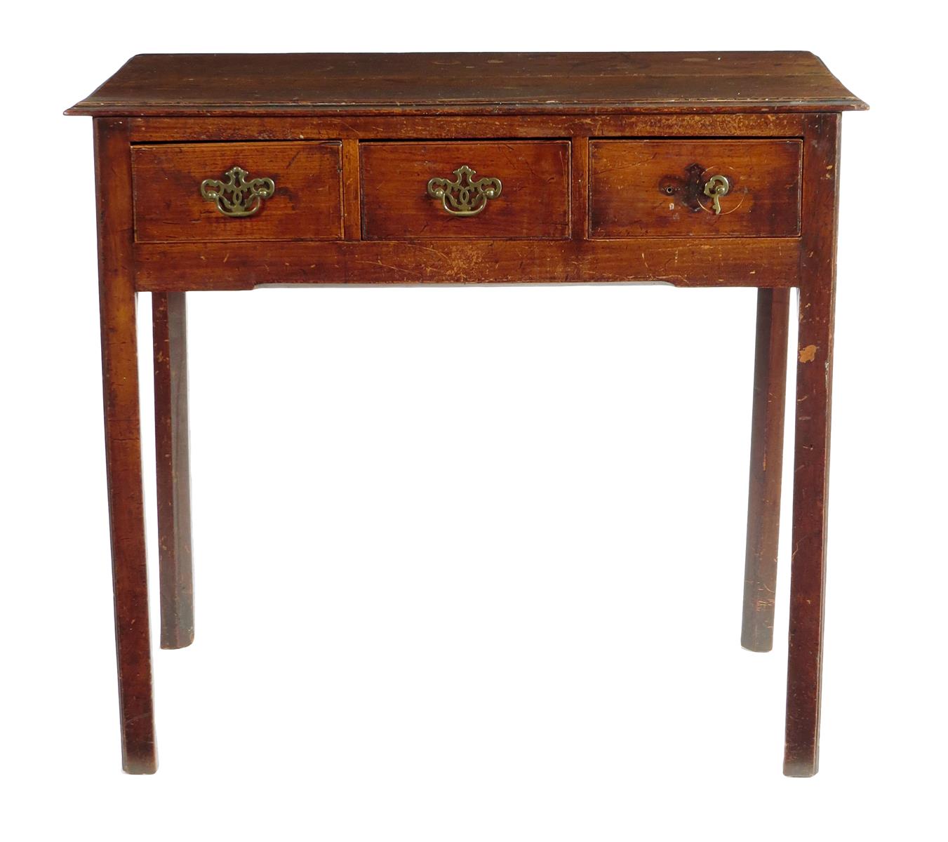 A George III fruitwood and elm side table, fitted with three frieze drawers on moulded and chamfered