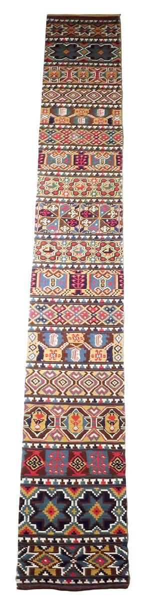 A Swedish flat weave tapestry runner, with panels of geometric designs, figures, dated '1883 and - Image 2 of 2