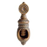 An early 19th century French boxwood screw action nutcracker, carved with rondels, 10.5cm long.