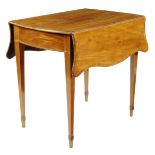 A George III mahogany serpentine Pembroke table, the drop-leaf top crossbanded in kingwood on square