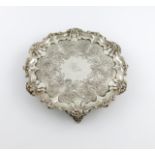 A William IV silver salver, by The Barnards, London 1835, circular form, foliate scroll border,