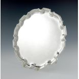 A modern silver salver, by S. J. Phillips, London 1986, circular form, moulded border, on three