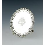 A George II silver waiter, by Gabriel Sleath, London 1742, circular form, moulded shell and scroll