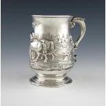 A George III silver mug, possibly by John Dutton, London 1773, baluster form, later embossed with