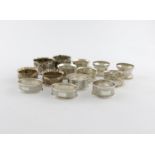 A mixed lot of silver napkin rings, various dates and makers, comprising: six pairs and two singles,