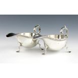 A pair of late-Victorian Britannia standard silver sauce boats, by Maurice Freeman, London 1899,