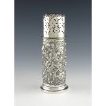 An Edwardian Irish silver sugar caster, by Charles Lambe, Dublin 1901, cylindrical form, embossed