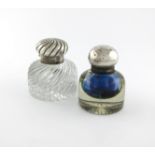 A late-Victorian silver-mounted glass inkwell, by Jenner and Knewstub, London 1885, circular