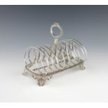 A George IV silver nine-bar toast rack, by Robert Hennell, London 1828, rectangular form, central