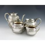 λ A four-piece Victorian silver tea and coffee set, by Elkington and Co, Birmingham 1891/92,