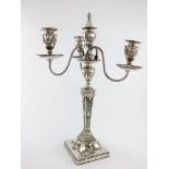 A Victorian silver four-light candelabra, by Elkington and Co, Birmingham 1888, tapering square