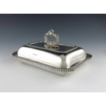 A silver entrée dish and cover with an associated handle, by Walker and Hall, Chester 1910, the