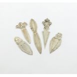 A small collection of five silver and metalware page markers, comprising: one by Georg Jensen,