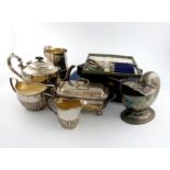 A mixed lot of electroplated and old Sheffield plated items, comprising: a three-piece tea set, a