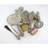 A mixed lot of silver items, various makers and dates, comprising: a three piece dressing table set,