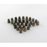 A collection of thirty silver and white-metal thimbles, various dates and makers, including one