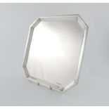 A silver salver, by E. Viner, Sheffield 1937, square form, canted corners, on four bracket feet,