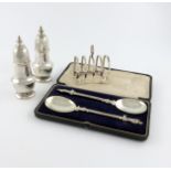 A mixed lot of silver items, various dates and makers, comprising: a pair of late-Victorian silver