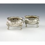 A pair of William IV Irish silver salt cellars, by William Nowland, Dublin 1830, circular cauldron