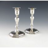 A pair of Victorian silver candlesticks, by Hawksworth Eyre and Co, London 1893, octagonal