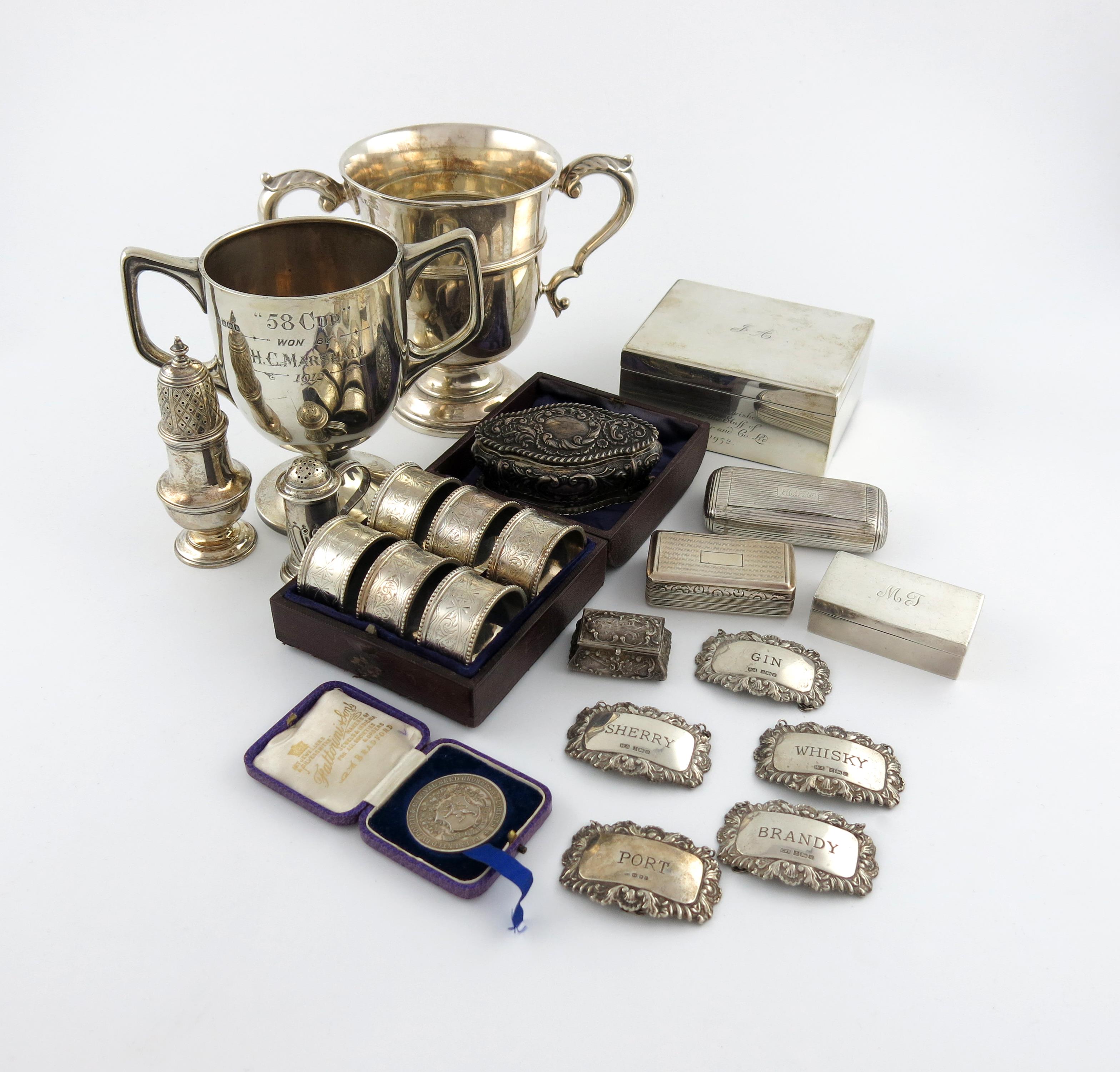 A mixed lot of silver items, various dates and makers, comprising: a cased set of six napkin