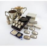 A mixed lot of silver items, various dates and makers, comprising: a cased set of six napkin