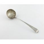 A George III silver Bright-cut soup ladle, by Sarah and John Blake, London 1816, the terminal with