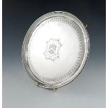 A George III silver salver, by Smith and Hayter, London 1802, circular form, moulded border, the