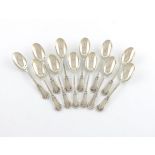 A set of twelve French silver coffee spoons, by Emile Puiforcat, scroll terminals, the reverse of