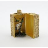 By Stuart Devlin, a modern silver-gilt surprise Christmas present, a Partridge in a Pear Tree,