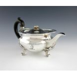 A George IV silver teapot, by Benjamin Smith, London 1924, shaped circular form, scroll handle,