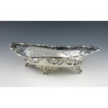 An Edwardian silver basket, by William Hutton and Son, Sheffield 1901, oval form, pierced foliate