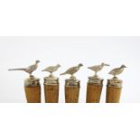 A set of five modern novelty silver bottle stoppers, by Asprey and Co Limited, London 1963/64,
