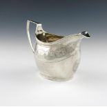 A George III silver cream jug, by William Bateman, London 1815, oval bellied form, engraved